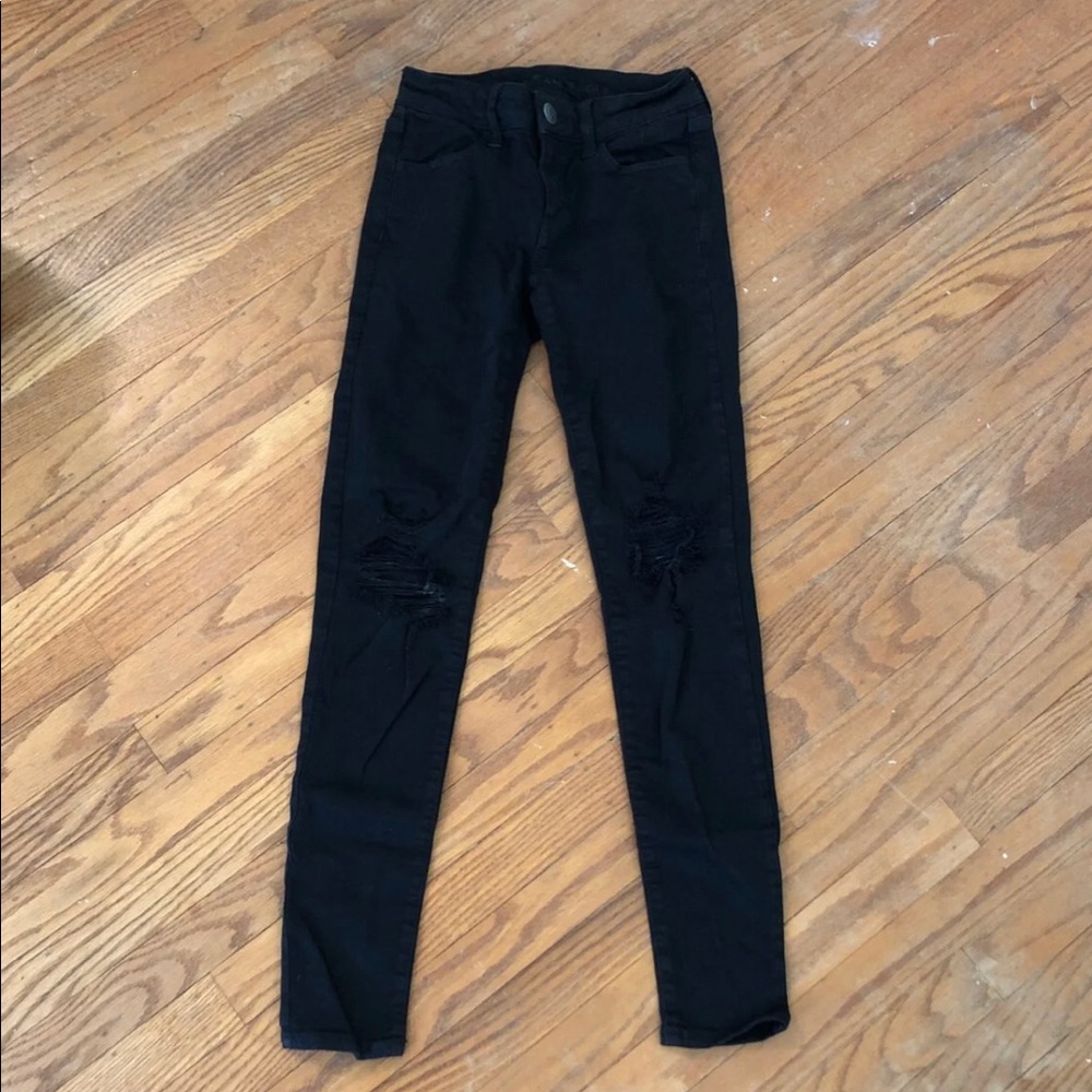 black distressed american eagle jeans